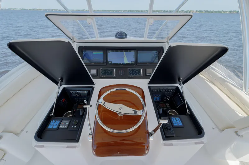 Time Away Yacht Photos Pics Helm of 2019 Viking 48 Convertible yacht with advanced navigation systems.