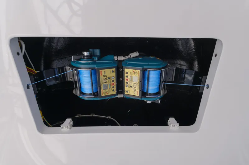 Time Away Yacht Photos Pics 2019 Viking 48 Convertible boat equipment compartment with blue wiring and components.