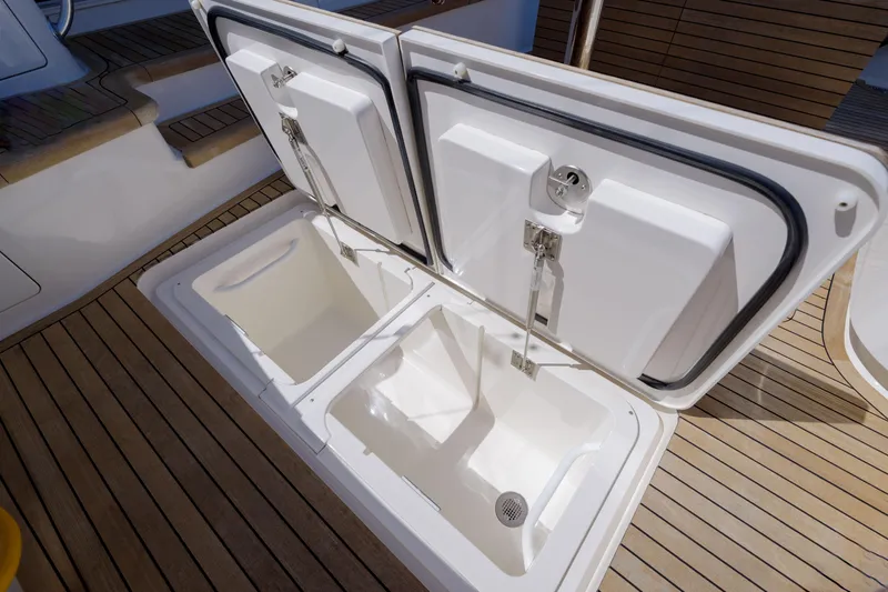 Time Away Yacht Photos Pics Open storage compartments on 2019 Viking 48 Convertible yacht deck.