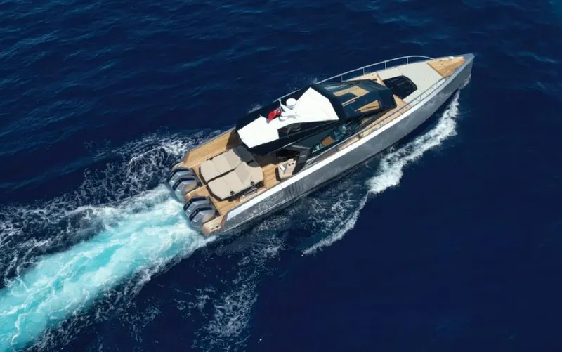  Yacht Photos Pics 2023 Wally WALLYPOWER 58X yacht cruising on open blue sea.