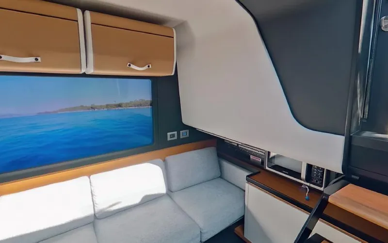  Yacht Photos Pics Interior of 2023 Wally WALLYPOWER 58X yacht with modern seating and ocean view.