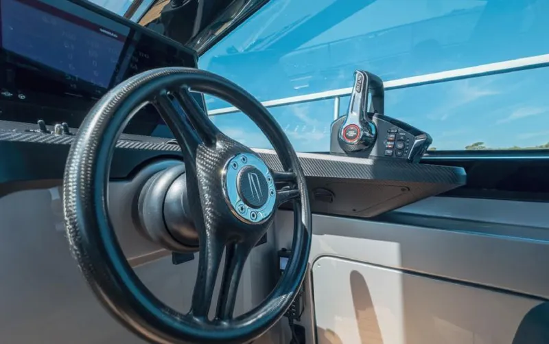 Yacht Photos Pics Steering wheel and controls of 2023 Wally WALLYPOWER 58X yacht cockpit.