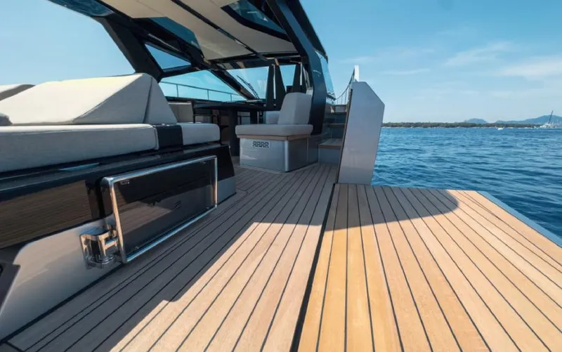  Yacht Photos Pics 2023 Wally WALLYPOWER 58X yacht deck with modern seating and ocean view.