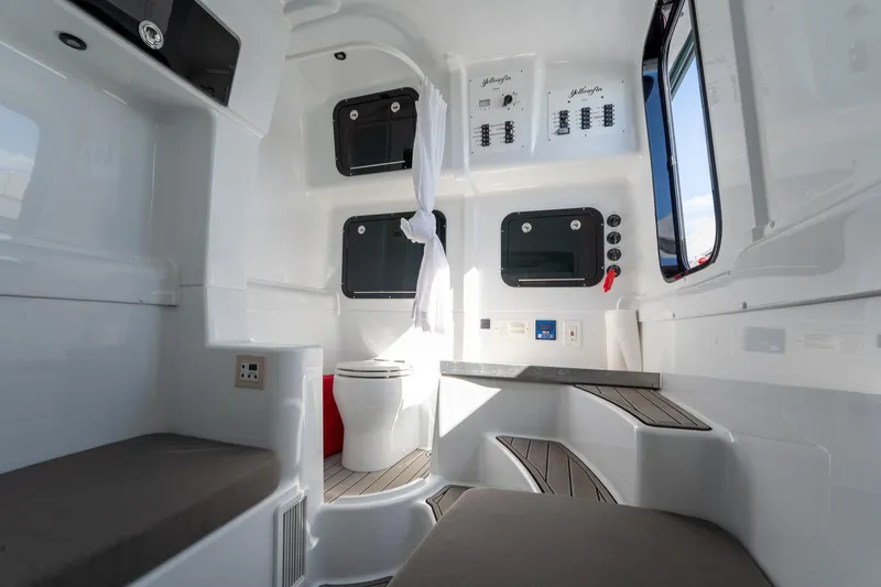  Yacht Photos Pics 2024 Yellowfin 42 Offshore interior with modern amenities and sleek design.