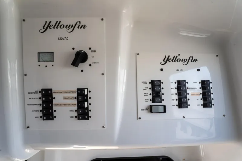  Yacht Photos Pics Electrical control panels on 2024 Yellowfin 42 Offshore boat, featuring 120VAC and 12VDC systems.
