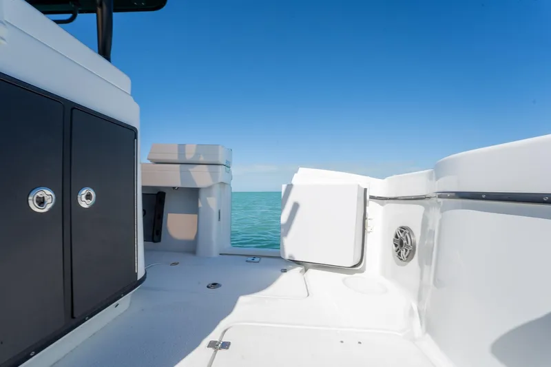  Yacht Photos Pics 2024 Yellowfin 42 Offshore boat deck with ocean view and clear blue sky.