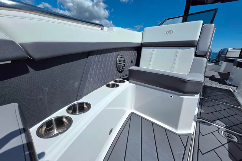  Yacht Photos Pics 2024 Cobalt R8 Outboard boat interior with cushioned seating and cup holders.