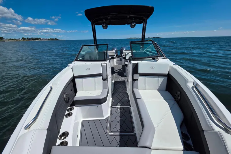  Yacht Photos Pics 2024 Cobalt R8 Outboard boat interior with luxurious seating on open water.
