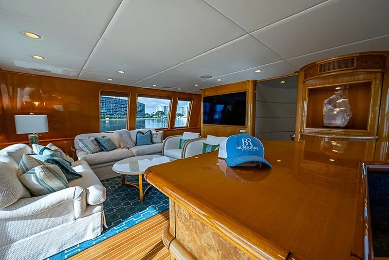 Probability Yacht Photos Pics Luxurious 1997 Delta Marine yacht interior with plush seating and elegant wood finishes.