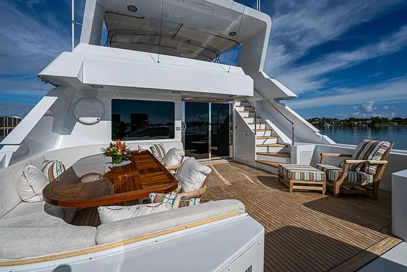 Probability Yacht Photos Pics Luxurious 1997 Delta Marine yacht deck with elegant seating and ocean view.
