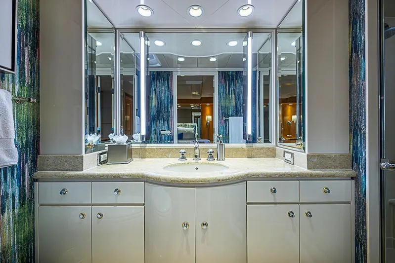 Probability Yacht Photos Pics Luxurious bathroom vanity with mirrors and lighting on a 1997 Delta Marine yacht.