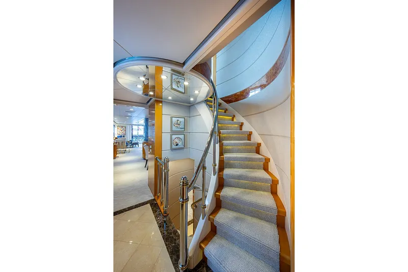 Probability Yacht Photos Pics Luxurious yacht interior with elegant spiral staircase, Delta Marine, 1997.