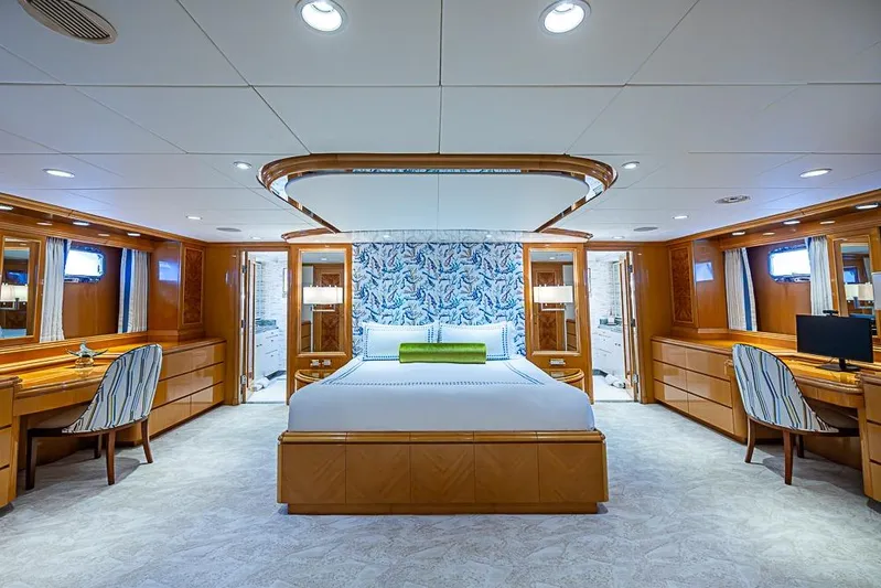 Probability Yacht Photos Pics Luxurious yacht bedroom interior with elegant wood furnishings, Delta Marine 1997 design.