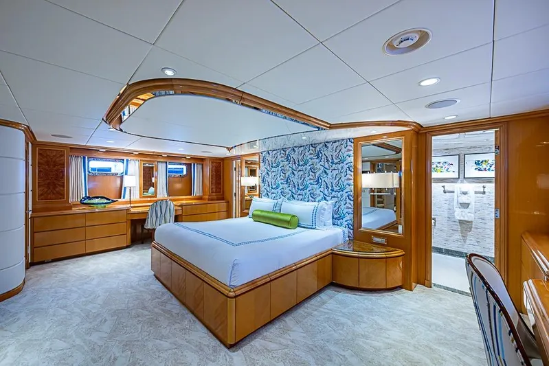 Probability Yacht Photos Pics Luxurious yacht bedroom interior with elegant wood finishes, Delta Marine 1997.