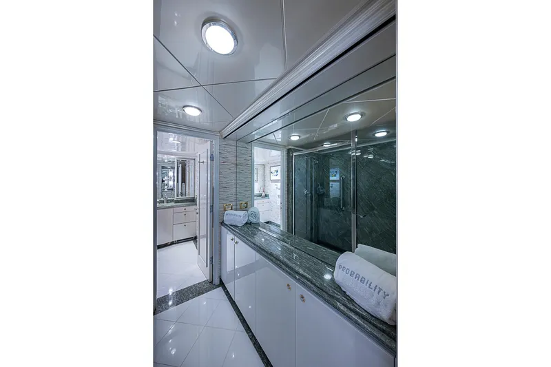 Probability Yacht Photos Pics Luxurious yacht bathroom with marble countertops, modern lighting, and elegant design, Delta Marine 1997.