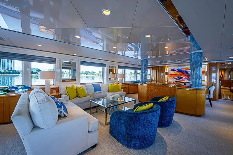 Probability Yacht Photos Pics Luxurious 1997 Delta Marine yacht interior with elegant seating and vibrant decor.