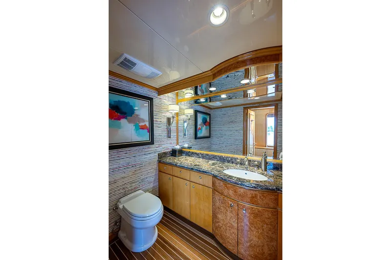 Probability Yacht Photos Pics Luxurious 1997 Delta Marine yacht bathroom with elegant wood and marble finishes.