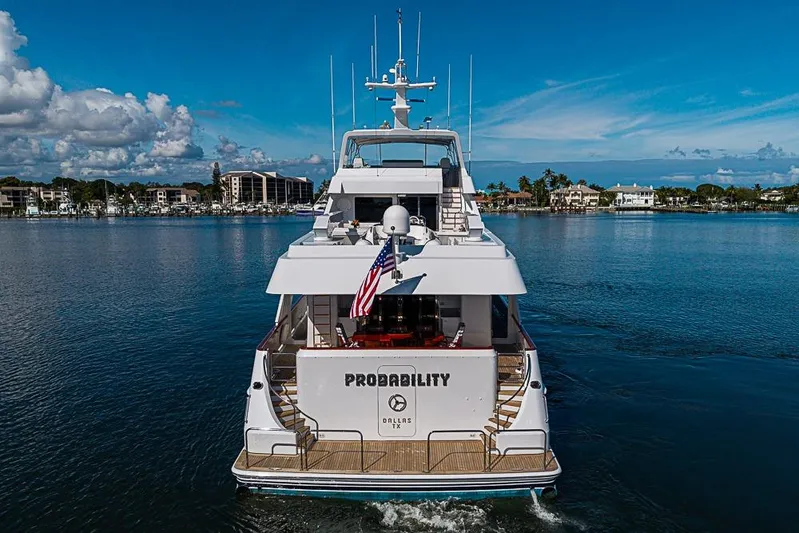 Probability Yacht Photos Pics Luxury yacht "Probability" by Delta Marine, 1997, cruising on a serene waterway.