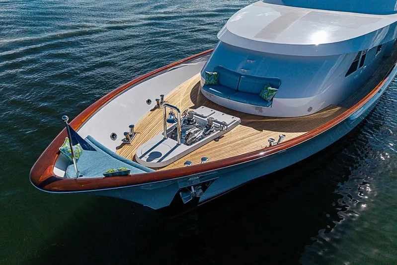 Probability Yacht Photos Pics Luxurious 1997 Delta Marine yacht with sleek design and elegant wooden deck.