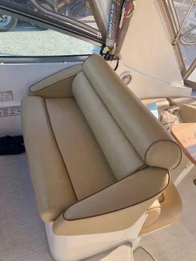  Yacht Photos Pics 1998 Cruisers Yachts 3870 Express interior with tan leather seating.