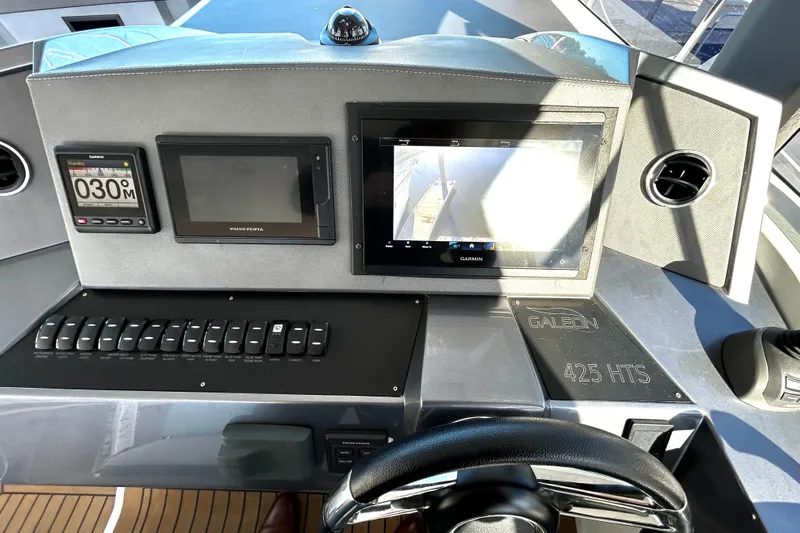 Zantical Yacht Photos Pics Helm of 2020 Galeon 425 HTS yacht with Garmin navigation displays and controls.