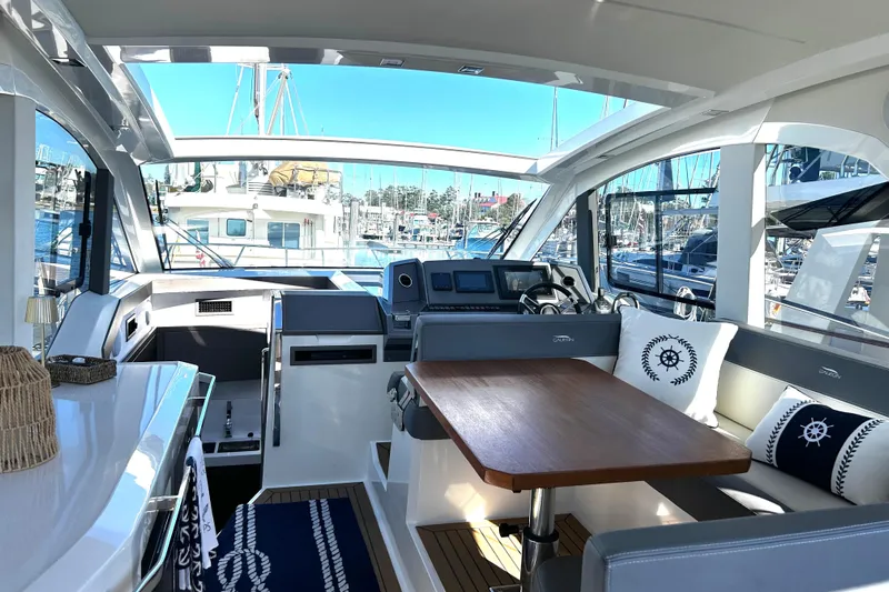 Zantical Yacht Photos Pics 2020 Galeon 425 HTS yacht interior with modern helm, seating, and nautical decor.