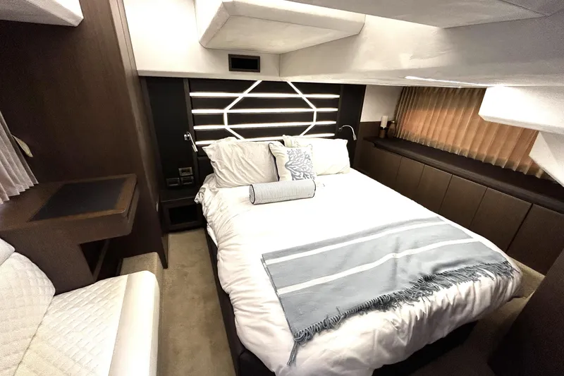 Zantical Yacht Photos Pics Luxurious bedroom interior of 2020 Galeon 425 HTS yacht with modern design elements.