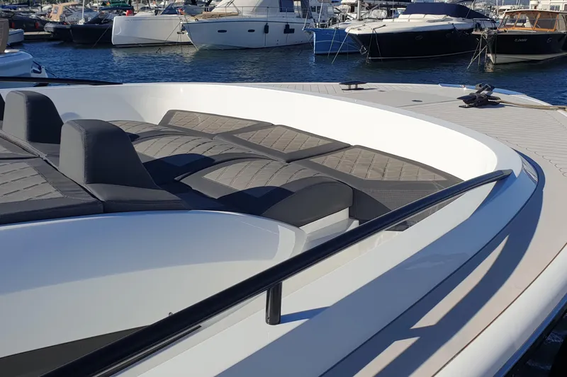 Malola Yacht Photos Pics 2022 Canados Gladiator 431 WA luxury yacht with sleek design and comfortable seating.