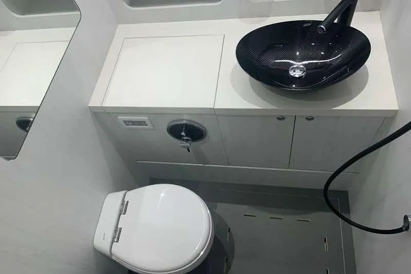 Malola Yacht Photos Pics Luxury bathroom in 2022 Canados Gladiator 431 WA yacht with modern fixtures.