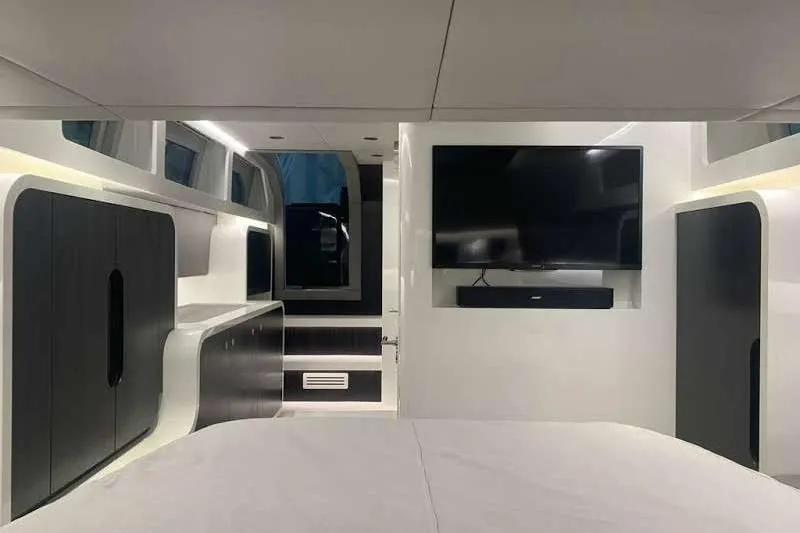 Malola Yacht Photos Pics Luxurious interior of 2022 Canados Gladiator 431 WA yacht with modern design and TV.