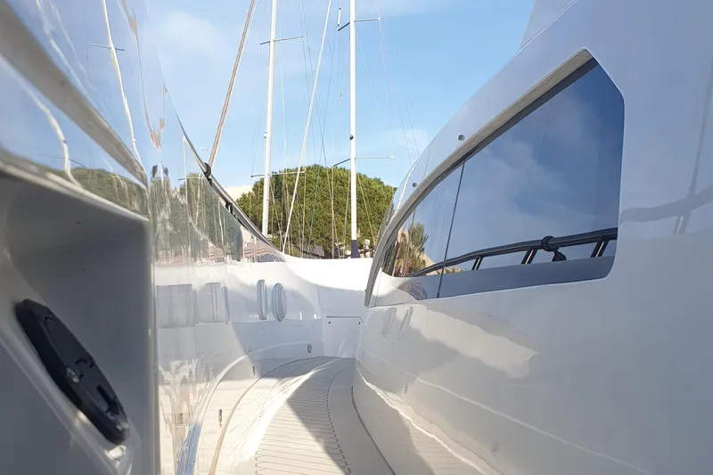 Malola Yacht Photos Pics 2022 Canados Gladiator 431 WA yacht deck with sleek design and reflective surfaces.