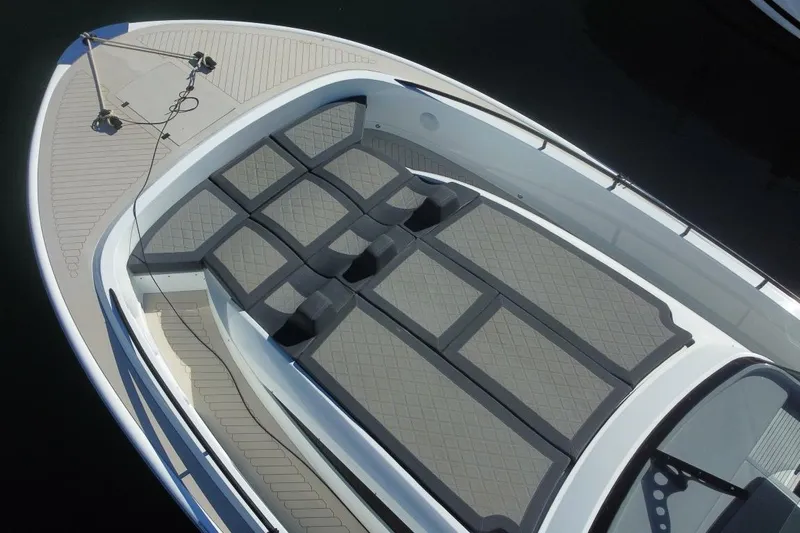 Malola Yacht Photos Pics 2022 Canados Gladiator 431 WA boat with spacious deck and cushioned seating.