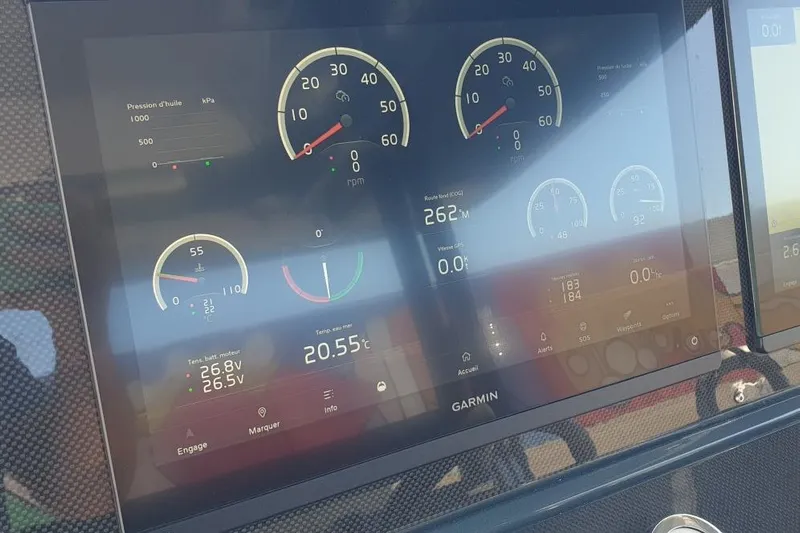 Malola Yacht Photos Pics Garmin display on 2022 Canados Gladiator 431 WA showing engine metrics and navigation data.