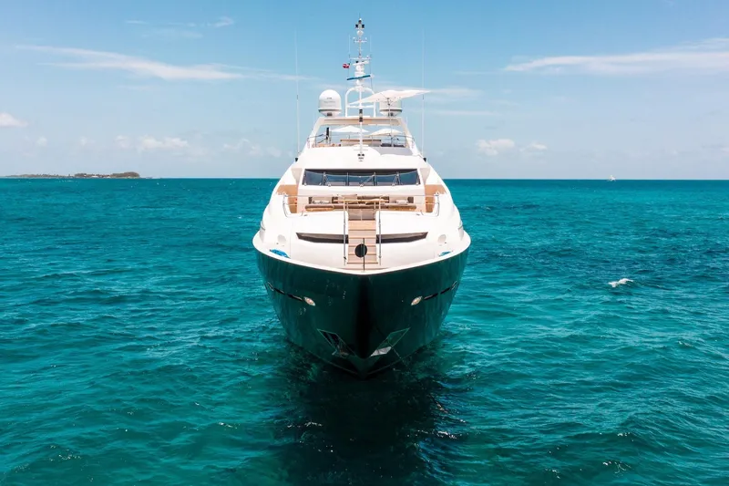 Marin Yacht Photos Pics Luxurious 2014 Sunseeker 131 yacht on clear blue ocean waters.