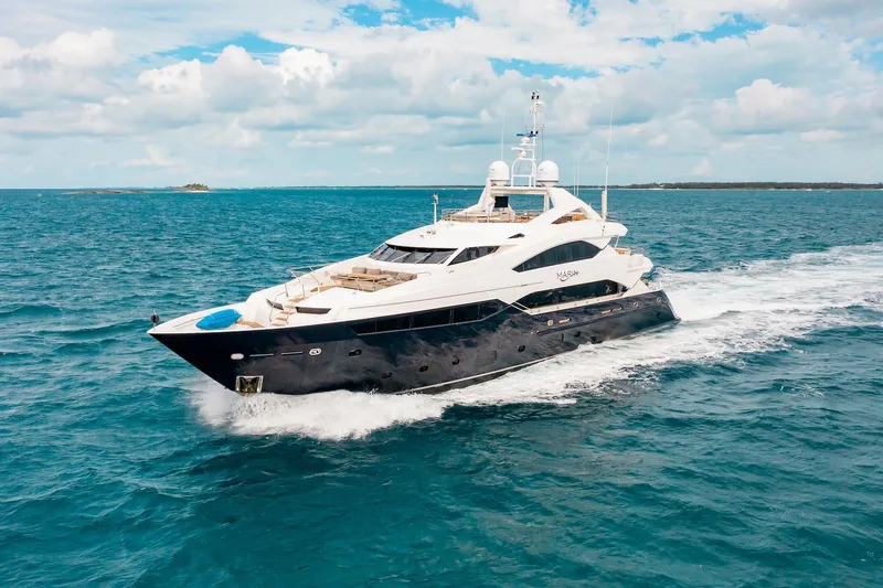 Marin Yacht Photos Pics Luxurious 2014 Sunseeker 131 yacht cruising on open sea under clear skies.