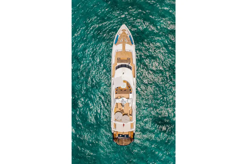 Marin Yacht Photos Pics Aerial view of 2014 Sunseeker 131 yacht on turquoise water.