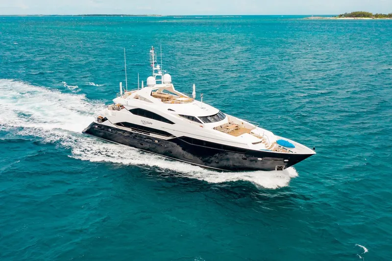 Marin Yacht Photos Pics Luxurious 2014 Sunseeker 131 yacht cruising on vibrant blue ocean waters.