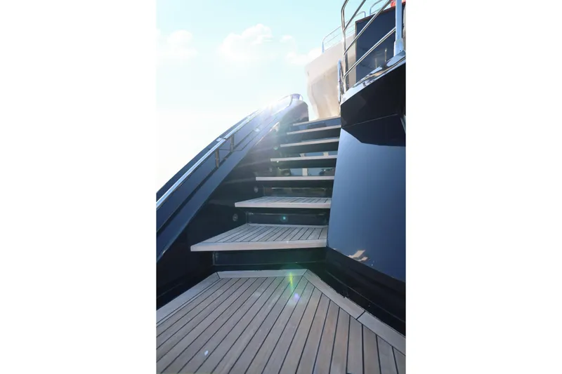 Marin Yacht Photos Pics Staircase on 2014 Sunseeker 131 yacht with sleek design and wooden decking.