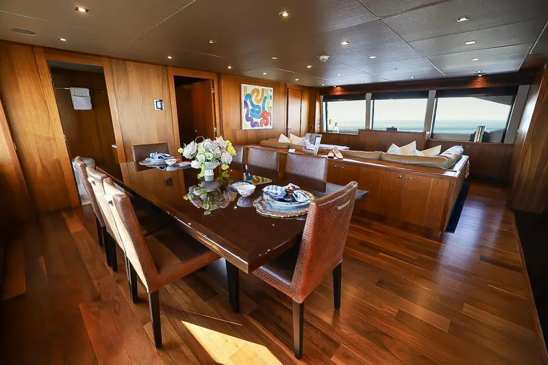 Marin Yacht Photos Pics Luxurious interior of 2014 Sunseeker 131 yacht with elegant dining and seating area.