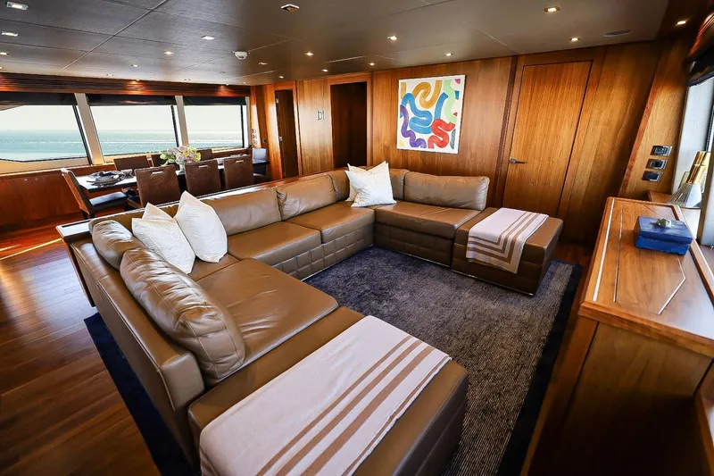 Marin Yacht Photos Pics Luxurious interior of 2014 Sunseeker 131 yacht with elegant seating and modern decor.