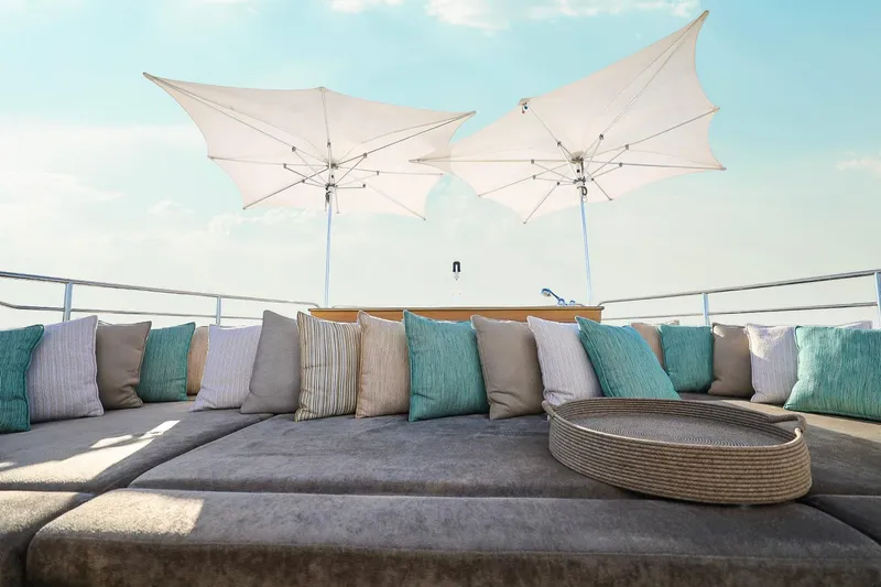 Marin Yacht Photos Pics Luxurious Sunseeker 131 yacht deck with cushions and umbrellas, 2014 model.