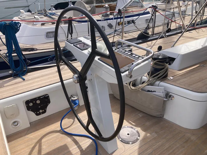  Yacht Photos Pics Steering wheel and controls on a 2022 Solaris 55 yacht deck.