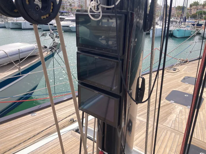  Yacht Photos Pics Control panels on a 2022 Solaris 55 yacht mast, docked in a marina.