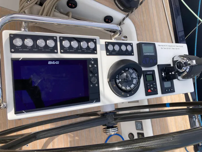  Yacht Photos Pics Control panel of a 2022 Solaris 55 yacht featuring navigation and winch controls.