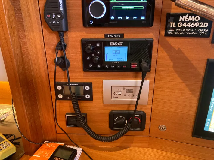  Yacht Photos Pics Control panel of a 2022 Solaris 55 yacht with communication and navigation equipment.