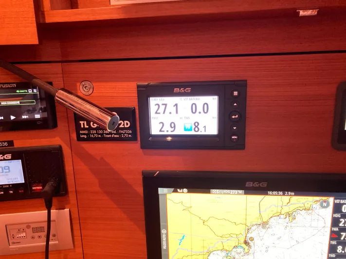  Yacht Photos Pics Control panel of a 2022 Solaris 55 yacht with navigation and temperature displays.