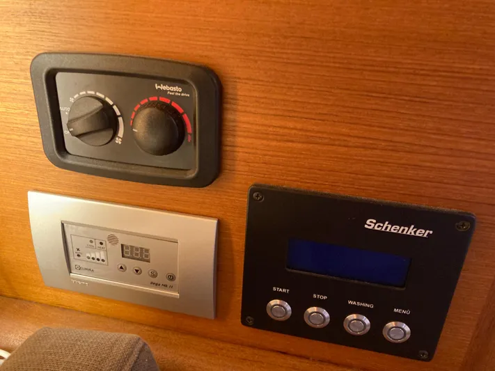  Yacht Photos Pics Control panels on a 2022 Solaris 55 yacht, featuring Webasto and Schenker systems.