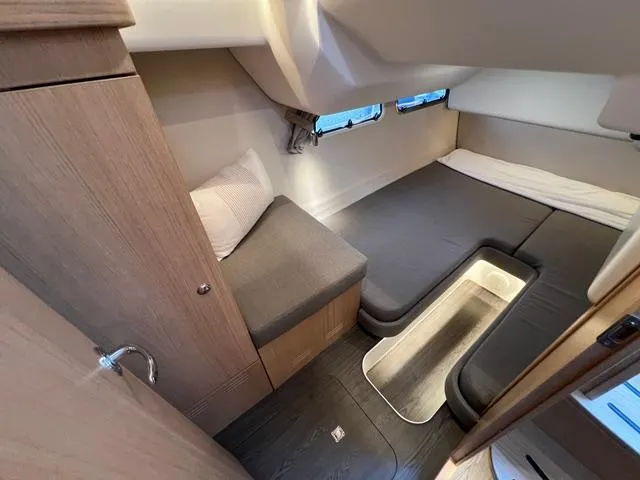 Crazy Love Yacht Photos Pics 2023 Nimbus 405 Coup&eacute; #124 cabin interior with seating and bed.
