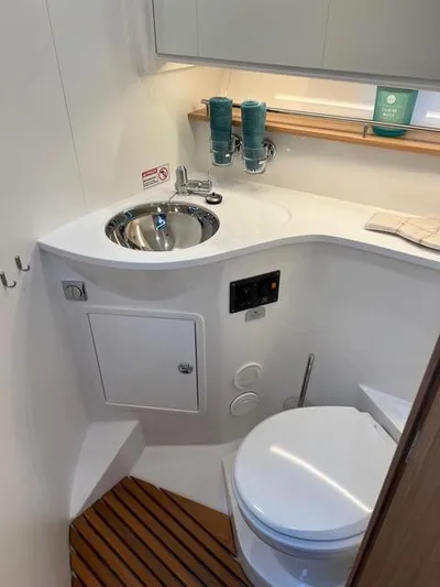 Crazy Love Yacht Photos Pics Modern bathroom in 2023 Nimbus 405 Coup&eacute; #124 yacht with sink and toilet.