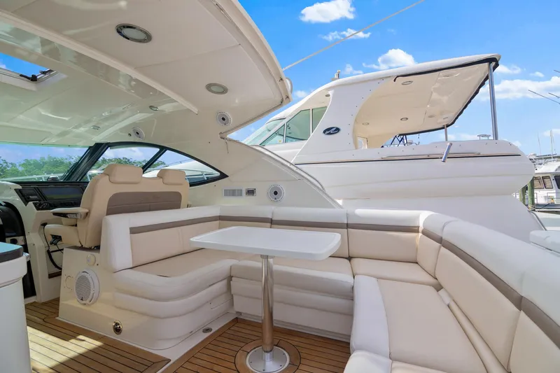  Yacht Photos Pics Luxurious 2013 Sea Ray 410 Sundancer yacht interior with plush seating and sleek design.
